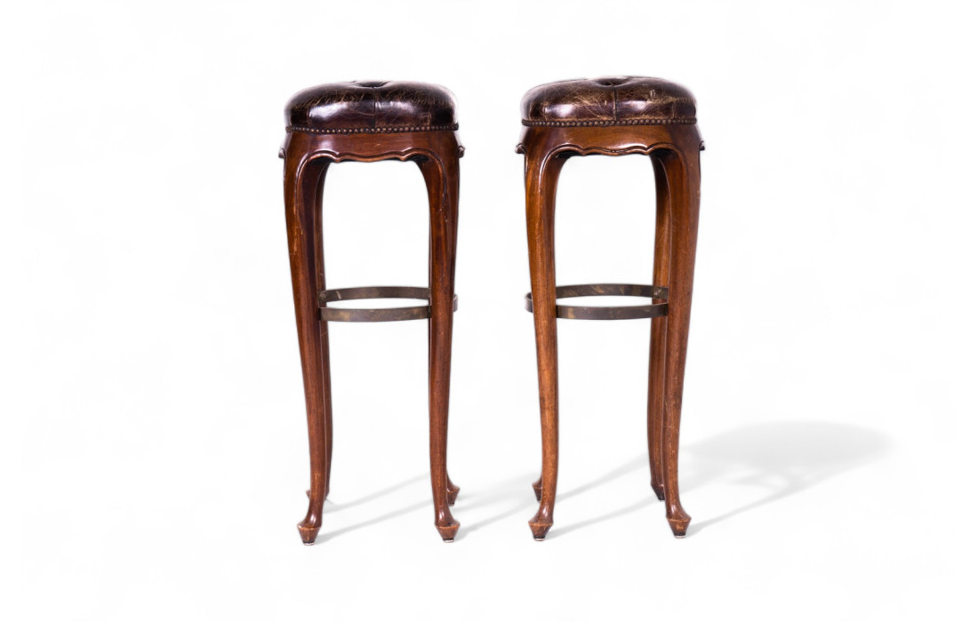 Two stools in genuine leather, 1960s.