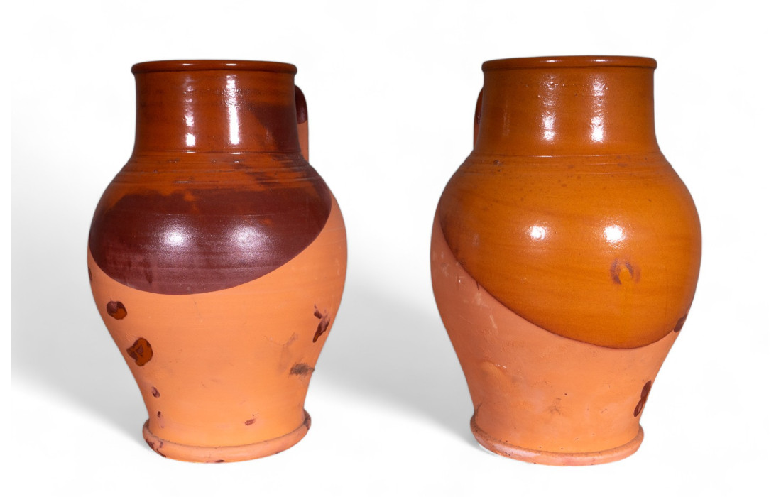 Pair of terracotta vases with handles