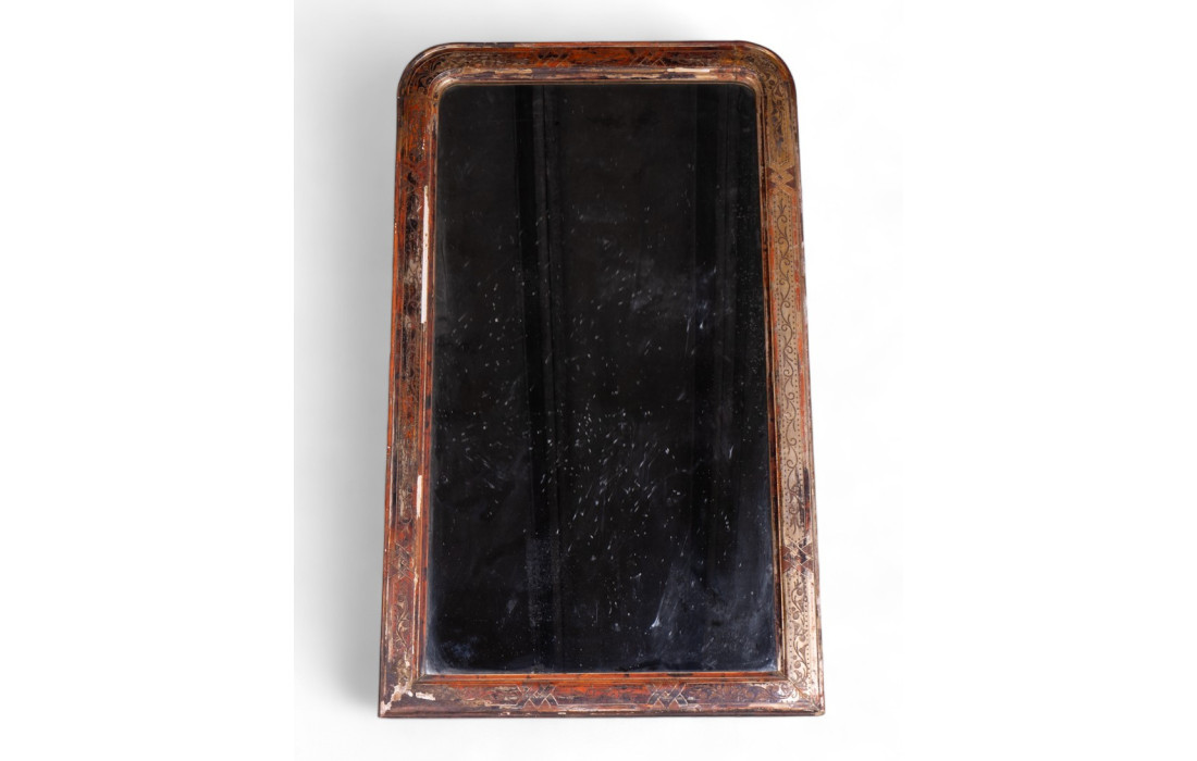 Ancient mirror with handmade ethnic frame